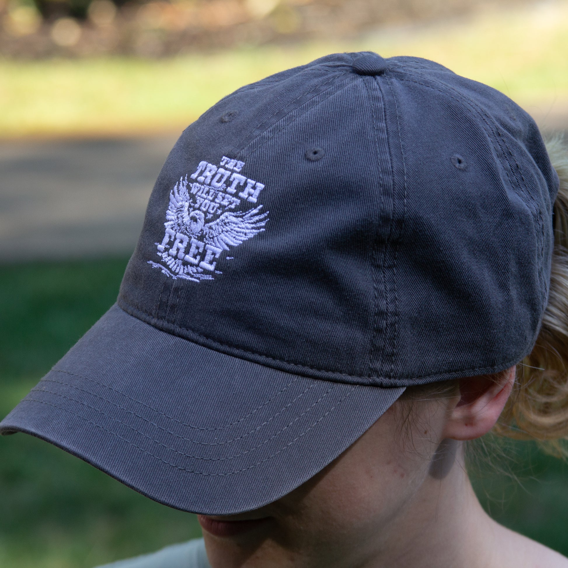 The Truth Eagle hat - charcoal color with white embroidered Truth logo on the front.