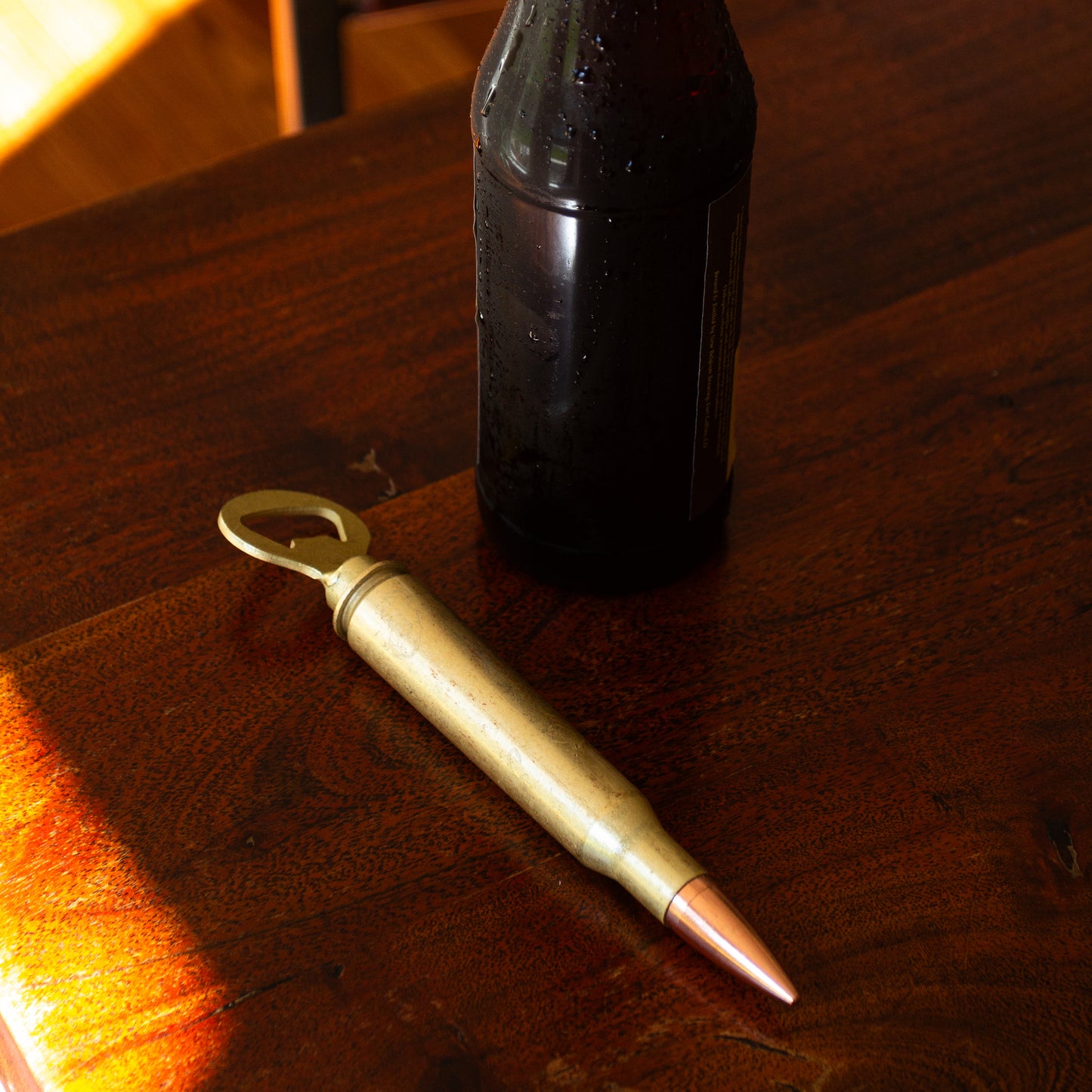 50 caliber bottle opener