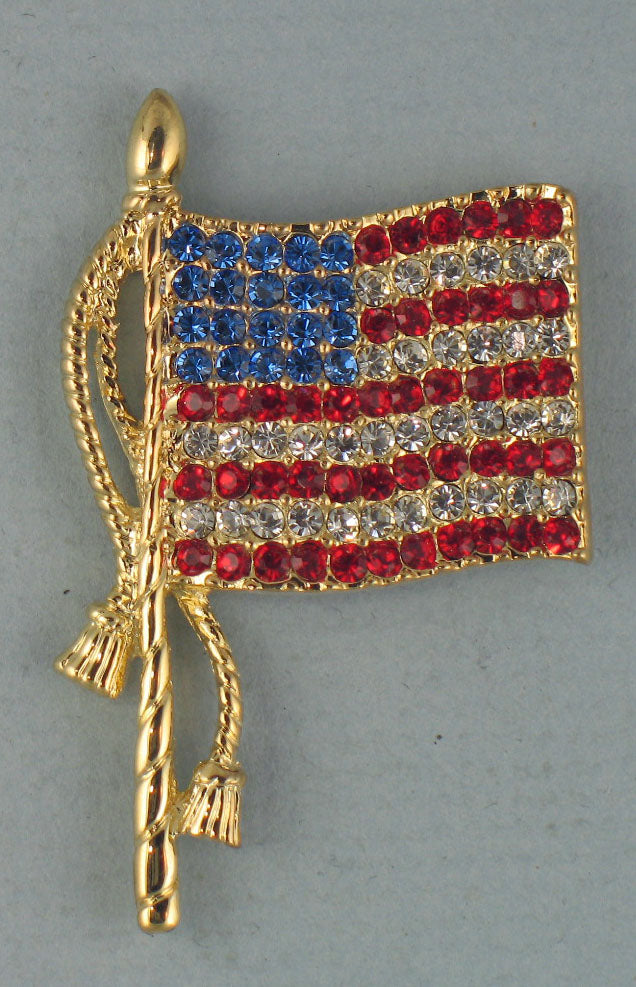 Flag brooch - gold with tassels